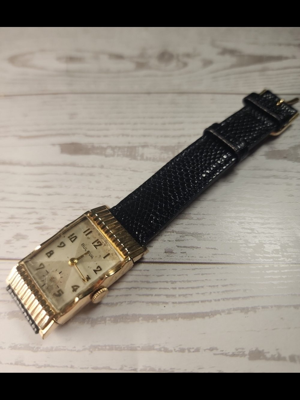 Bulova Vintage Gold-Tone Rectangular Watch with Black Leather Strap